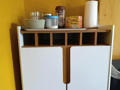 a shelf with food on top of a refrigerator at Ecolodge Ribeira Principal in Xá Xá