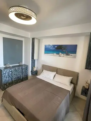 a bedroom with a large bed in a room at Luxury Beachhouse Apartment Boa Vista in Sal Rei