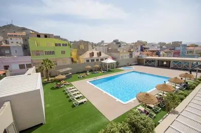 an overhead view of a swimming pool on top of a building at Oasis Porto Grande in Mindelo
