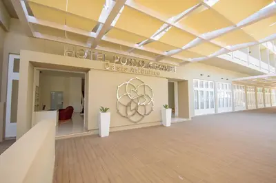 a large room with a sign that reads hotel portal grande casino affiliate at Oasis Porto Grande in Mindelo