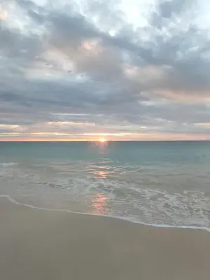 a beach with a cloudy sky and the ocean at Beach house Agua Viva, Praia de Chaves, Boa Vista, Sal Rei, Cape Vert, 50mt spiaggia in Cabeçadas