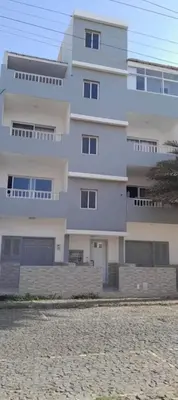 a large white building with a lot of windows at Casa Relaxod in Santa Maria
