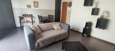 a living room with a couch and a table at casa verde lucas in Mindelo