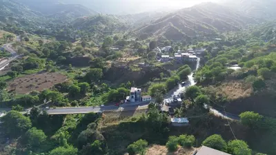 an aerial view of a mountain with a road at VILLA NAYELI Luxury and Simplicity in Órgãos