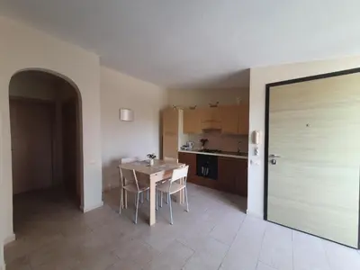 a kitchen with a table and chairs in a room at Appartement Amalia Sal Santa Maria in Prainha