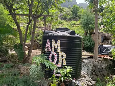 a large barrel with the wordanna written on it at Tiny House Ribeira Principal in Mato Correia