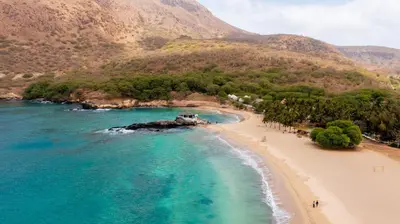 an aerial view of a beach with people on it at Oasis Tarrafal Alfandega Suites in Tarrafal