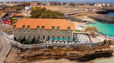 an aerial view of a house on the beach at Oasis Tarrafal Alfandega Suites in Tarrafal