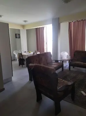 a living room with a couch and a table at Apartamento T2 em Sal Rei - Boavista in Sal Rei