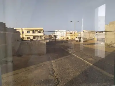 a view of an empty parking lot from a window at Apartamento T2 em Sal Rei - Boavista in Sal Rei