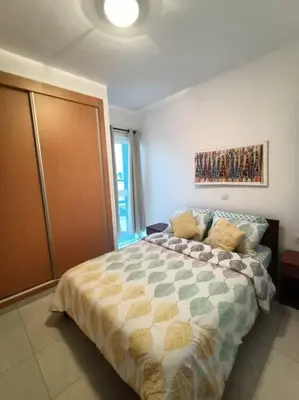 a bedroom with a large bed in a room at New, Modern, and Cozy 3 Bedroom Apartment. in Santa Maria
