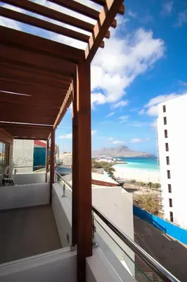a balcony with a view of the ocean at Luna Boutique Hotel in Mindelo