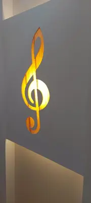 a sign with a dollar sign on a ceiling at Luna Boutique Hotel in Mindelo
