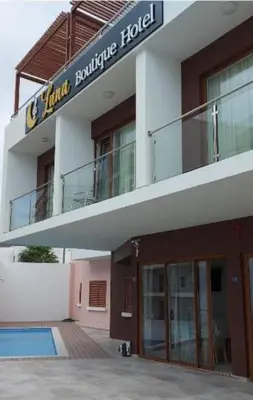a building with a sign that reads main building hotel at Luna Boutique Hotel in Mindelo