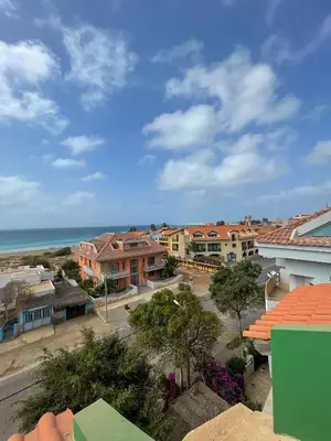 a view of a town with houses and the ocean at New Rooftop Gem with stunning Oceanview in Santa Maria