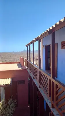 a building in the middle of the desert at Casa Azul in Mindelo