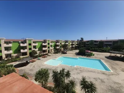 an aerial view of a resort with a swimming pool at Holiday Properties Moradias Green in Santa Maria