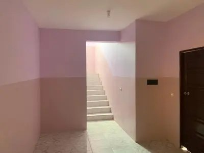 a staircase in a room with purple walls at CA FILO in Espargos
