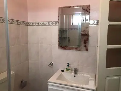 a bathroom with a sink and a mirror at CA FILO in Espargos