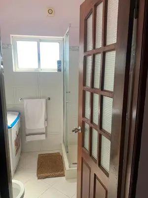 a bathroom with a shower and a toilet and a door at CA FILO in Espargos