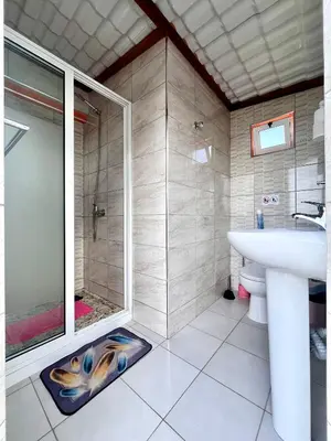 a bathroom with a shower and a sink at Casa BB&Djassi - ROOMS in Ponta do Sol