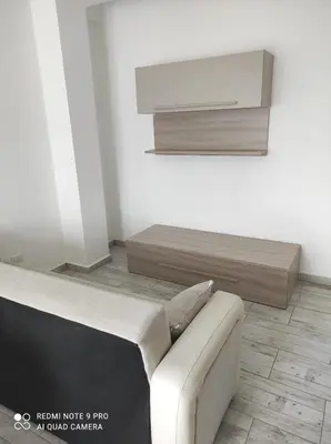 a living room with a couch and a wall at Casa Veronica Boavista in Sal Rei