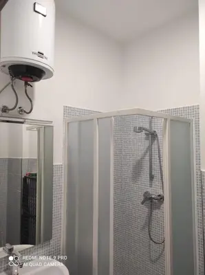 a bathroom with a shower with a glass door at Casa Veronica Boavista in Sal Rei