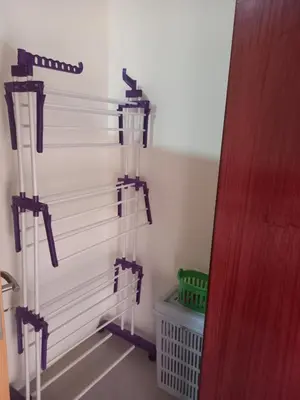 a room with two glass shelves on a wall at Nifa House in Espargos