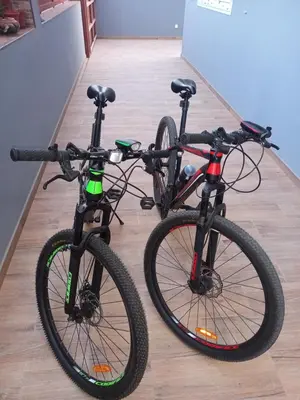 two bikes parked next to each other on a floor at Nifa House in Espargos