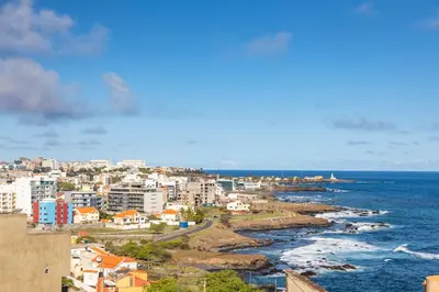 a view of a city and the ocean at 3 bdr aprt, amazing seaview, rooftop pool - LCGR in Praia