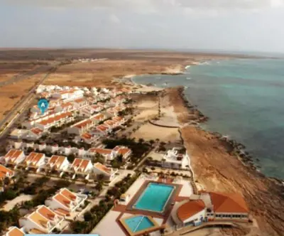 an aerial view of a resort near the ocean at Murdeira Village V155A in Beirona