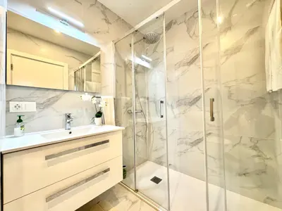 a bathroom with a shower and a sink at SunSet in Santa Maria