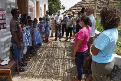 a group of people standing outside of a building at Pousada Dragoeiro Monte Joana Santo Antão in Ribeira Grande
