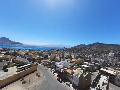 an aerial view of a city with the ocean at Bellavista in Mindelo