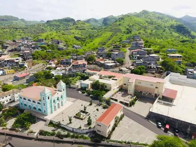 an aerial view of a town with mountains in the background at Kaza Mamai di Fora in Calheta de São Miguel