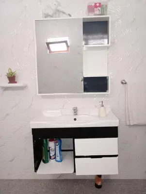 a bathroom with a sink and a mirror at Kaza Mamai di Fora in Calheta de São Miguel