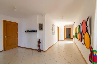 a hallway with white walls and surfboards on the wall at Sky Mariposa sospesa sul mare in Mindelo