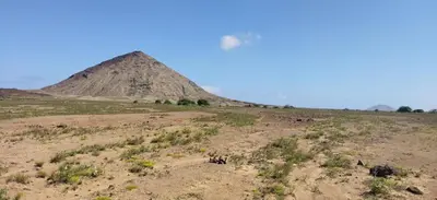 a pyramid in the middle of a field at SOL AZUL in Santa Maria