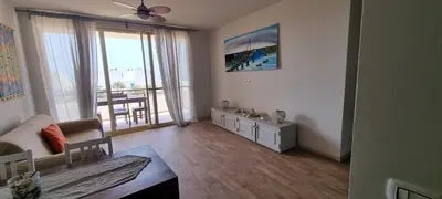 a living room with a couch and a table at Casa Visto Mar in Sal Rei
