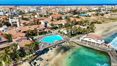 an aerial view of a resort with a beach at Porto Antigo 2 - By Bobbywashere in Santa Maria